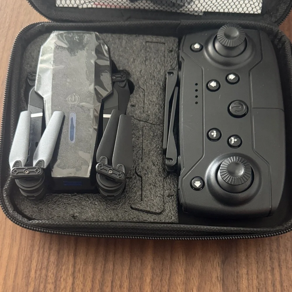 Mini wireless drone with remote control and 2 cameras can connect to smartphones